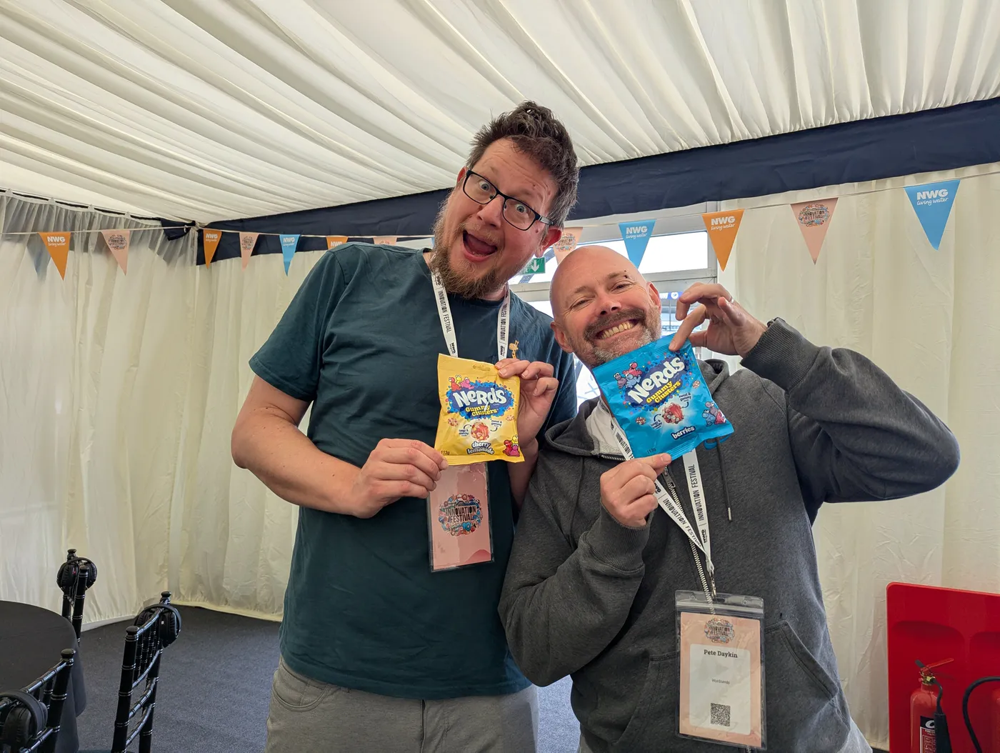 Steve Erdal and Pete Daykin of Wordnerds holding bags of Nerds sweets at the Northumbrian Water Innovation Festival